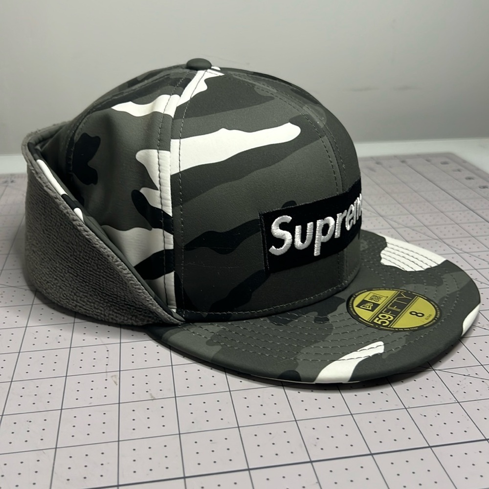 Supreme x New Era WINDSTOPPER Earflap Box Logo Cap Snow Camo Size 8 - Picture 3 of 5